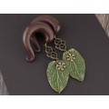 Woodland gauge earrings for stretched ears Dangle green leaf plugs Celtic knot tunnels Handmade